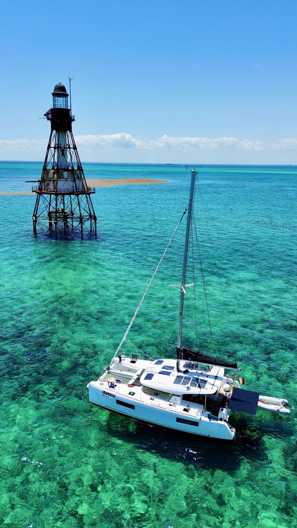 Laurelli anchored beside a remote reef lighthouse