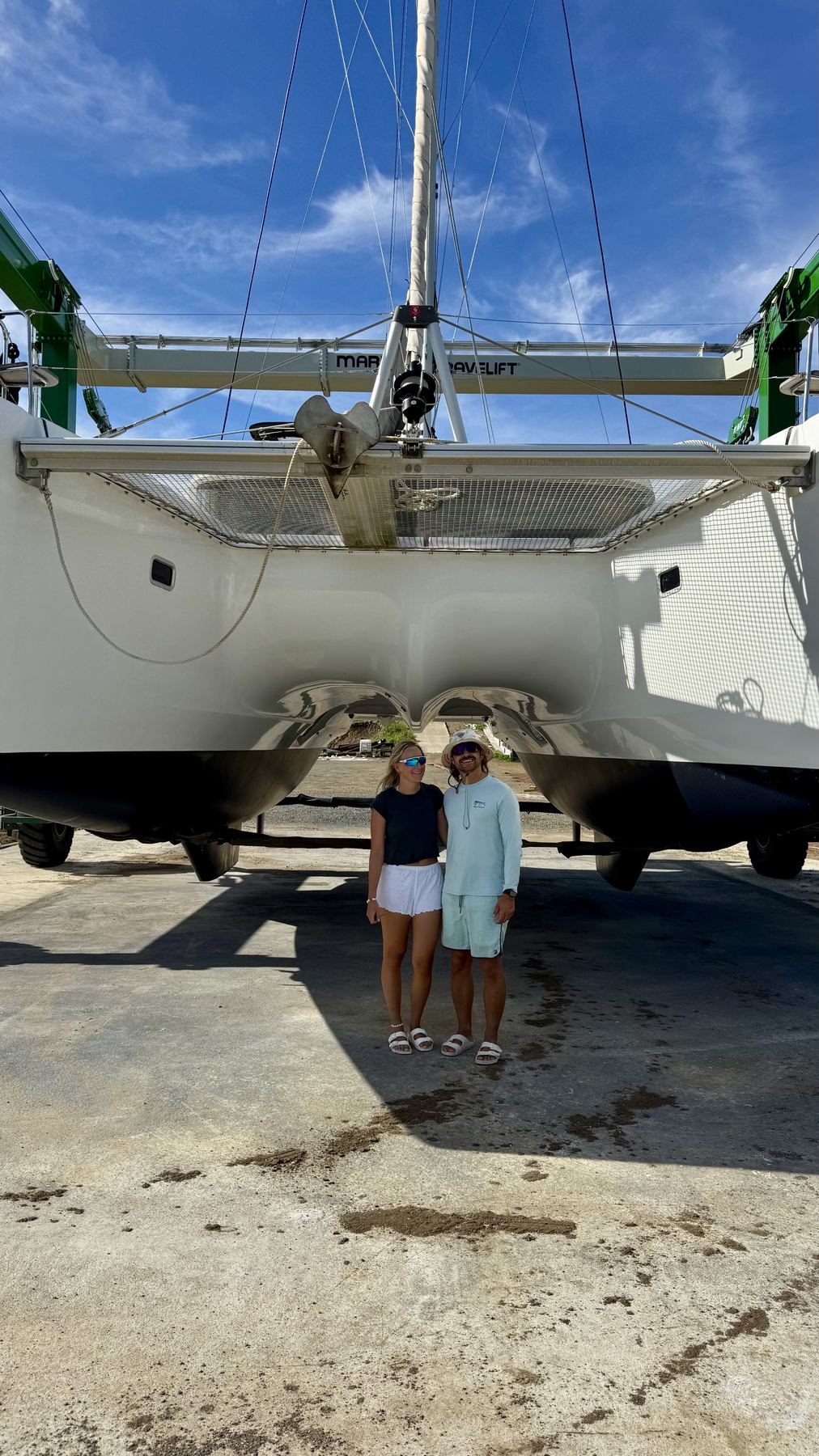 Felix and Ella under the hulls of Laurelli in Grenada