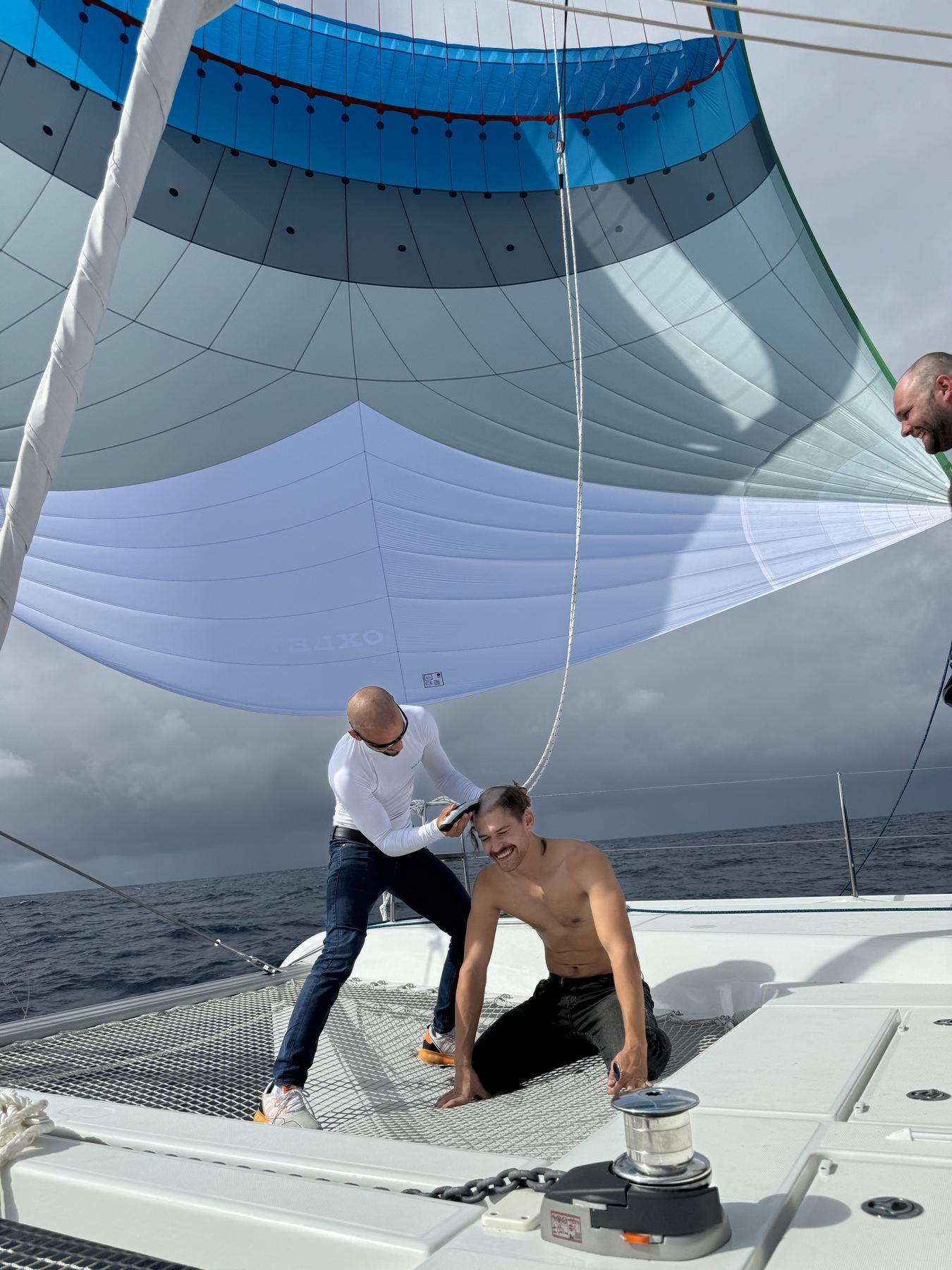 Crew celebrating on deck during the first transatlantic crossing